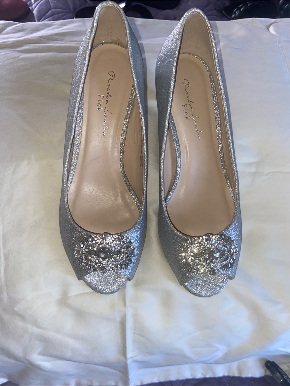 pink paradox London Silver Glitter Peep-Toe Heels with Jeweled Accent